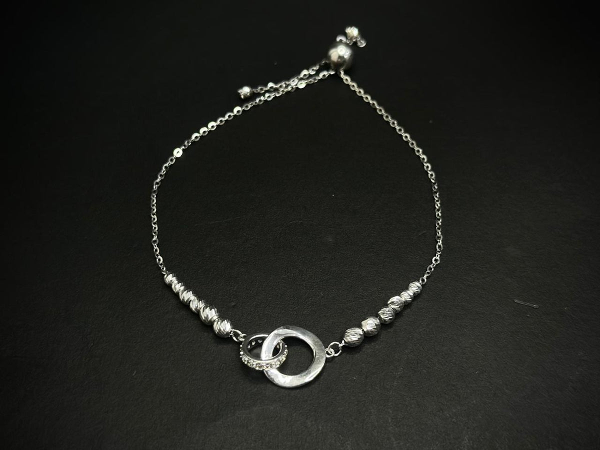 Infinity Orbit – 925 Silver White Gold Plated Adjustable Bracelet