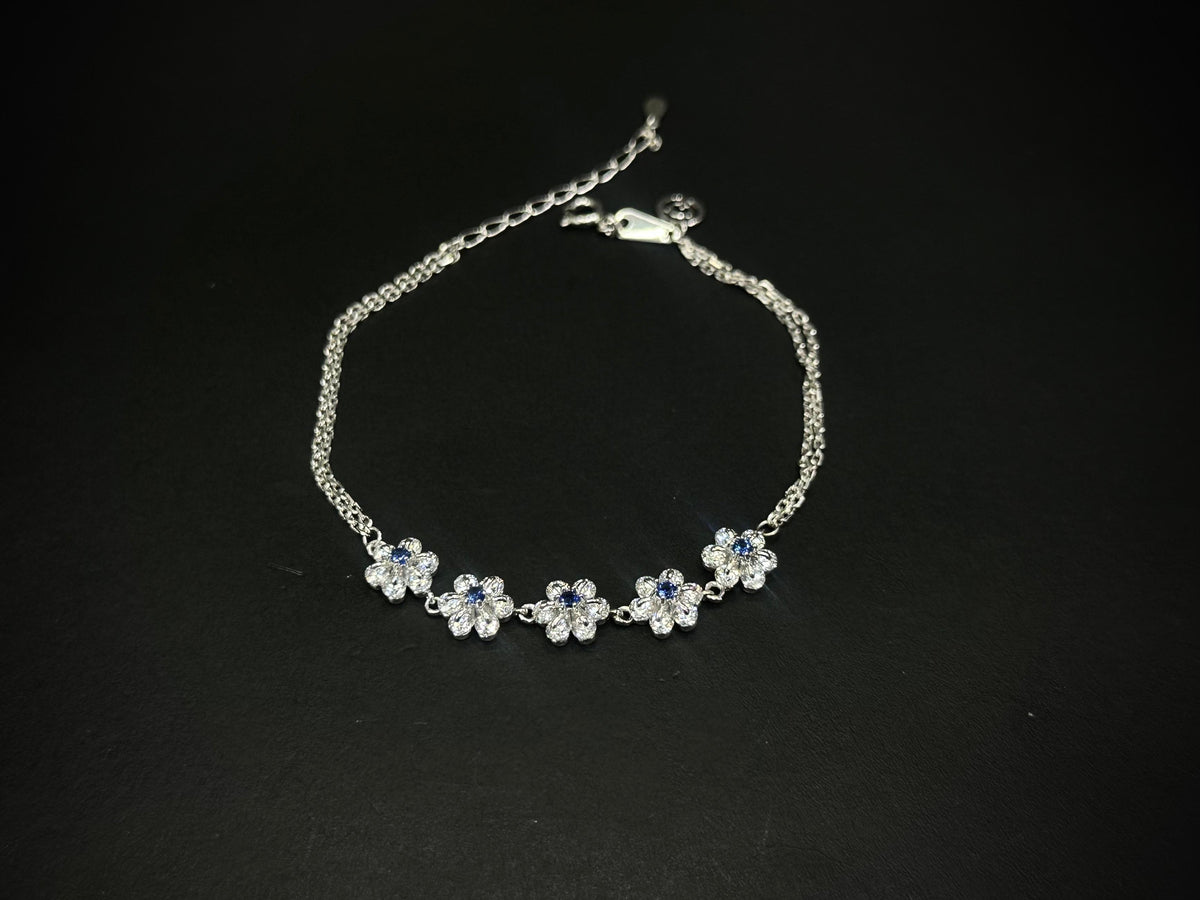 Bloom Radiance – 925 Silver Floral Dancing Stone Bracelet